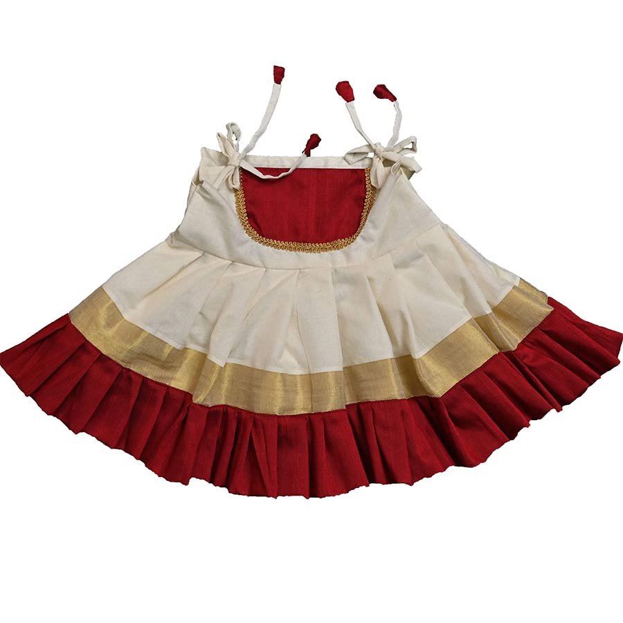 A well crafted ethnic outfit for her first milestones. A unique design to inspire sweet and memorable moments.