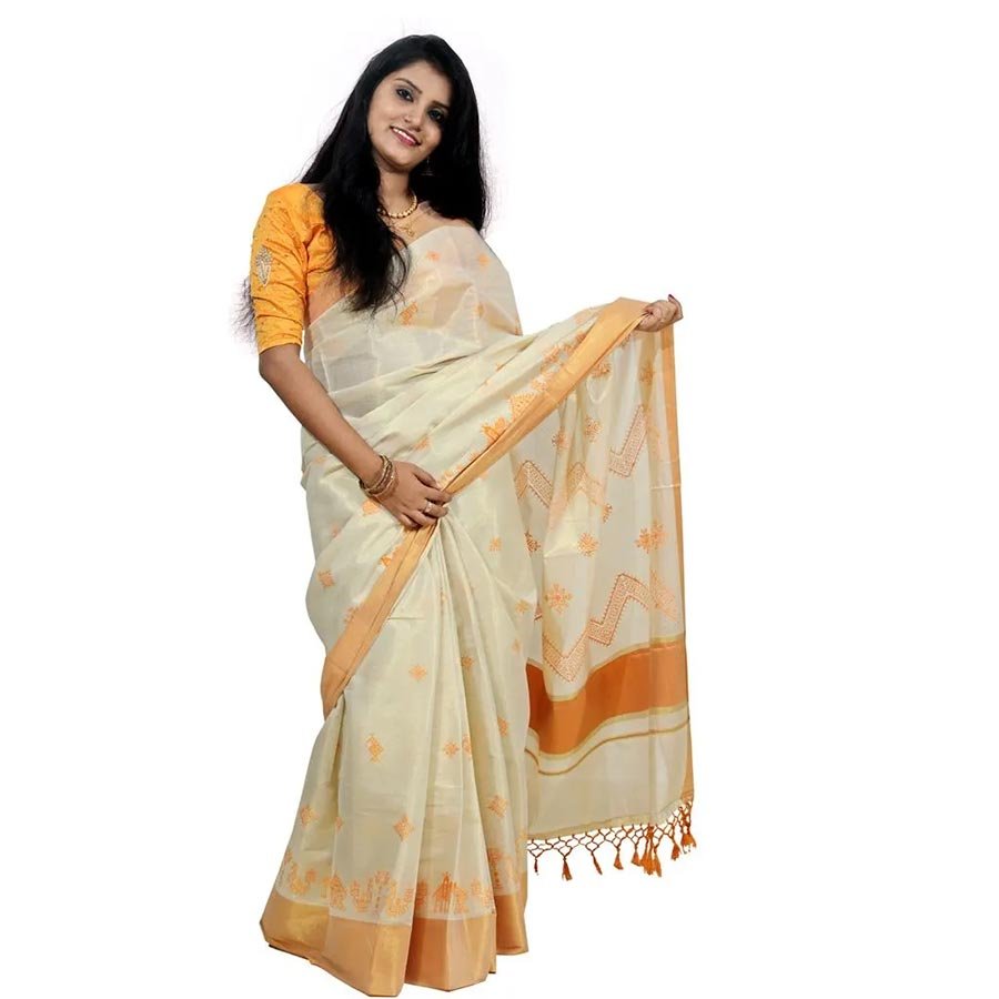 An exclusive blend of Kerala and Karnataka cultures. A traditional Kerala tissue saree adorned with elegant Kasuti embroidery. An exclusive collection from Ekatva